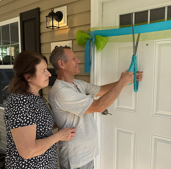 Ribbon cutting on a new Habitat for Humanity home.